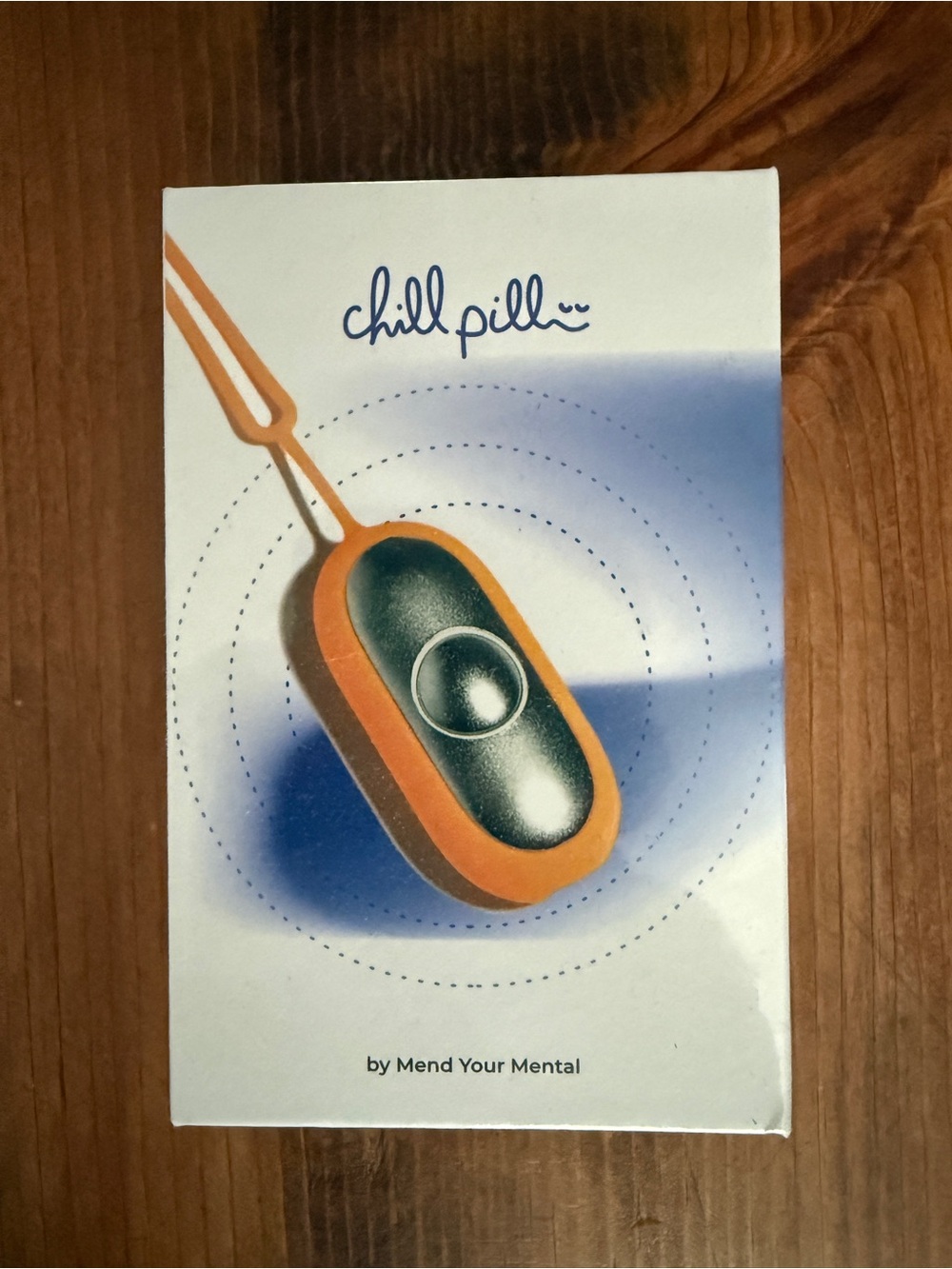 chill pill™ Orange and Black Wearable Wellness Pendant by
